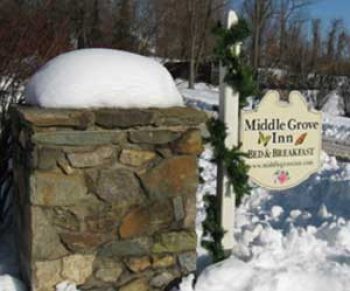 snowy home sign